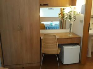 Kuchyň nebo kuchyňský kout v ubytování Hotel Leuco'