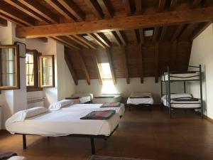 Katil atau katil-katil dalam bilik di Hostal Rural Haizea