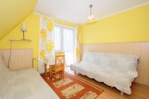 Posteľ alebo postele v izbe v ubytovaní Pokoje Gościnne Pod Gubałówką