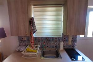 Gambar di galeri bagi Cosy guest house with private yard di Saronida