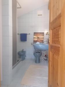 a bathroom with a sink and a toilet at Haus Pieschl in Pertitschach