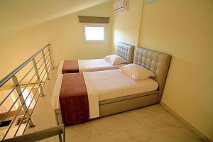 Posteľ alebo postele v izbe v ubytovaní Sky Rays Luxury Apartments
