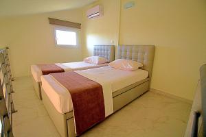 Posteľ alebo postele v izbe v ubytovaní Sky Rays Luxury Apartments