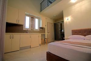 Posteľ alebo postele v izbe v ubytovaní Sky Rays Luxury Apartments