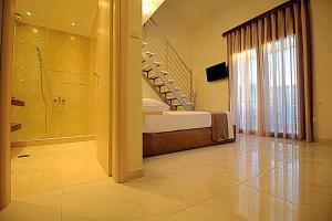 Posteľ alebo postele v izbe v ubytovaní Sky Rays Luxury Apartments