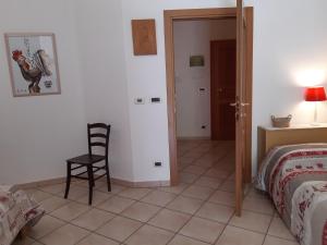 Łóżko lub łóżka w pokoju w obiekcie Il Pesco - CIR 0024