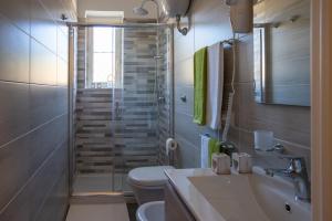 Ένα μπάνιο στο B&B L'Abbraccio +36 φωτογραφίες