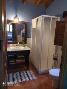 Ванная комната в Refugio con Casitas Infantiles