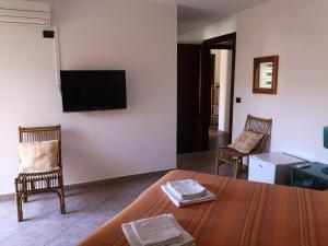 TV a/nebo společenská místnost v ubytování B&B La Terrazza