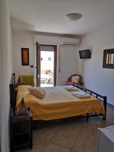 Postel nebo postele na pokoji v ubytování B&B La Terrazza