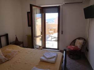 Letto o letti in una camera di B&B La Terrazza