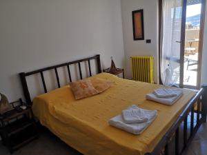 Letto o letti in una camera di B&B La Terrazza