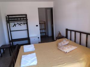 Letto o letti in una camera di B&B La Terrazza