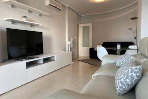TV a/nebo společenská místnost v ubytování Bahía del Sol 7 by Vivirel Calpe