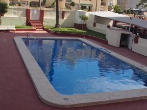 a large swimming pool on top of a building at virginia-48-2 in Benidorm
