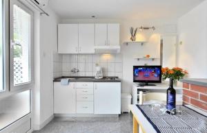 Kuchyň nebo kuchyňský kout v ubytování Studio apartments 4 two