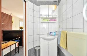 TV a/nebo společenská místnost v ubytování Studio apartments 4 two