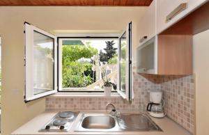 Kuchyň nebo kuchyňský kout v ubytování Studio apartments 4 two