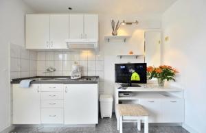 Kuchyň nebo kuchyňský kout v ubytování Studio apartments 4 two