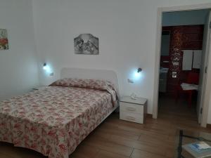 Giường trong phòng chung tại Da Ida e Gianni
