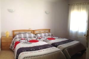 Postel nebo postele na pokoji v ubytování Apartamento en Playa de Levante Vistas impresionantes