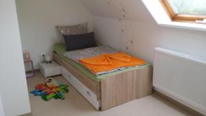 Cama ou camas em um quarto em Ferienwohnung-Panoramablick