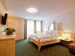 Letto o letti in una camera di Sagritzerwirt