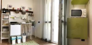 Kuchyň nebo kuchyňský kout v ubytování Green Corner Gelsomino