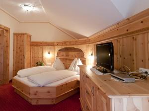 Letto o letti in una camera di Sagritzerwirt