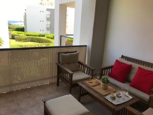 Posedenie v ubytovaní Apartamento VenAVera Playa de Baria 2 K-1D Primera Línea Gran Terraza y WIFI