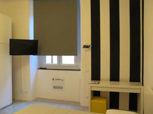 TV a/nebo společenská místnost v ubytování Old Town Guest House