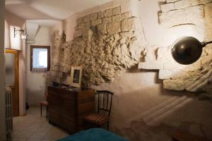 Posteľ alebo postele v izbe v ubytovaní Assisi Anfiteatro Romano