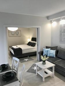 Ένα ή περισσότερα κρεβάτια σε δωμάτιο στο Apartamenty Porto Eli