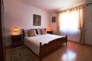 Postel nebo postele na pokoji v ubytování MONTE Beach Apartments