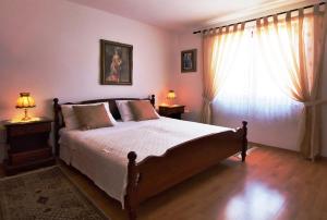 Postel nebo postele na pokoji v ubytování MONTE Beach Apartments