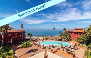 a view of the swimming pool at the sentinel hotel at Puerto Nuevo Baja Hotel & Villas in Rosarito