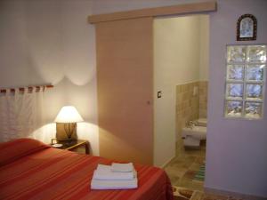 Letto o letti in una camera di Pà Blanc B&B