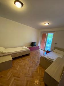 Ένα ή περισσότερα κρεβάτια σε δωμάτιο στο Villa Marta