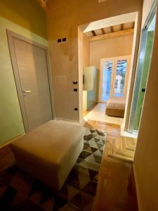 Postel nebo postele na pokoji v ubytování Il cortile di Elen