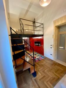 Postel nebo postele na pokoji v ubytování Il cortile di Elen
