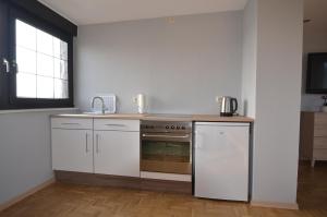 Kuchyň nebo kuchyňský kout v ubytování Ferienwohnung Bouten B
