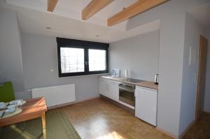 Kuchyň nebo kuchyňský kout v ubytování Ferienwohnung Bouten B