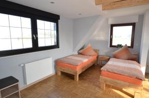 Postel nebo postele na pokoji v ubytování Ferienwohnung Bouten B
