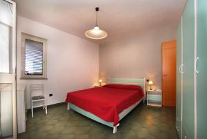 Postel nebo postele na pokoji v ubytování La Contessa