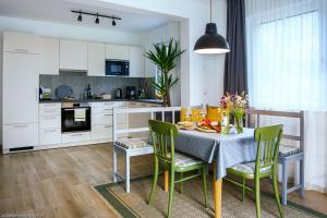 Kuchyň nebo kuchyňský kout v ubytování Apartment Brigitte