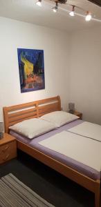 Säng eller sängar i ett rum på Apartments Varga