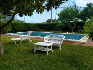 Kolam renang di atau dekat dengan Chalet con piscina privada en Vinaròs