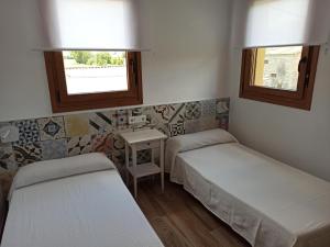 Cama o camas de una habitación en Hornillos Meeting Point (Pilgrim Hostel)