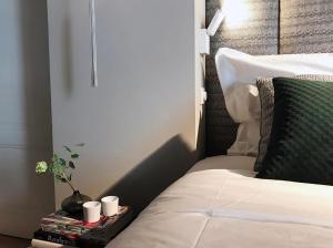 Een bed of bedden in een kamer bij Suite Londen66