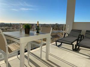 A balcony or terrace at Playa Flamenca - Turquesa del Mar - great sea view!